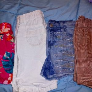 4 pairs of Girl's sz 10/12 shorts. One is NWT